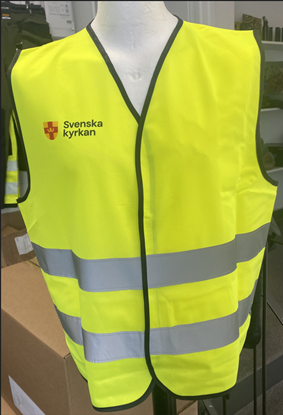 Bild på Väst med reflexband. Svenska kyrkan. Nya logotypen. OBS! Small/medium. Tillfällig upplaga.